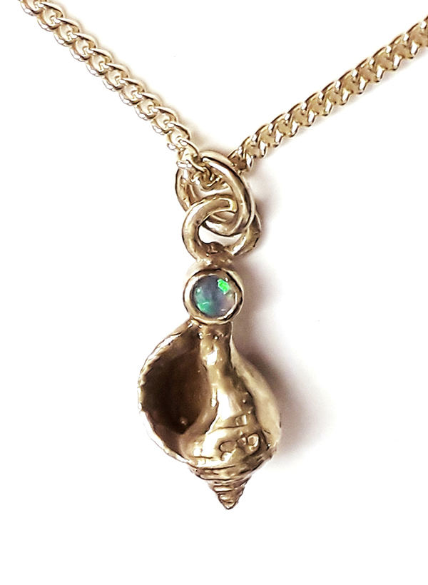 Gold whelk shell necklace